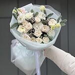 Букет Зимнее Вдохновение из ранункулюсов, роз, эустомы, брунии и нобилиса